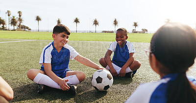 Buy stock photo Bonding, children or soccer team on field with ball, cool down or friendly match on weekend break. Fitness, rest or kids with happiness, football competition or socialising in childhood sports hobby.