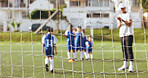 Net, soccer and coach with kids for penalty shootout, football trial or sports day on grass field. People, children or team with cheering instructor or outdoor fitness drill for goal, score or point