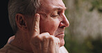 Thinking, sad and senior man with memory, reflection or nostalgia in backyard on weekend. Planning, grief and elderly male person in retirement with remember, relax and calm in nature with peace.