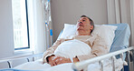 Thinking, medical and sad with old man in hospital bed for reflection, cancer diagnosis and icu. Mindfulness, healthcare and fear with senior person in recovery ward of clinic for healing and sick