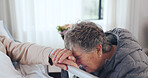 Holding hands, sick and senior couple on bed in home for bonding, support or comfort in medical recovery. Rest, sad and elderly woman hugging man in bedroom for care, marriage and retirement in house