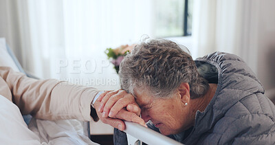 Buy stock photo Holding hands, crying and senior couple on bed in hospital for bonding, support or comfort in medical recovery. Sick, sad and elderly woman with man in clinic for care, marriage and retirement.