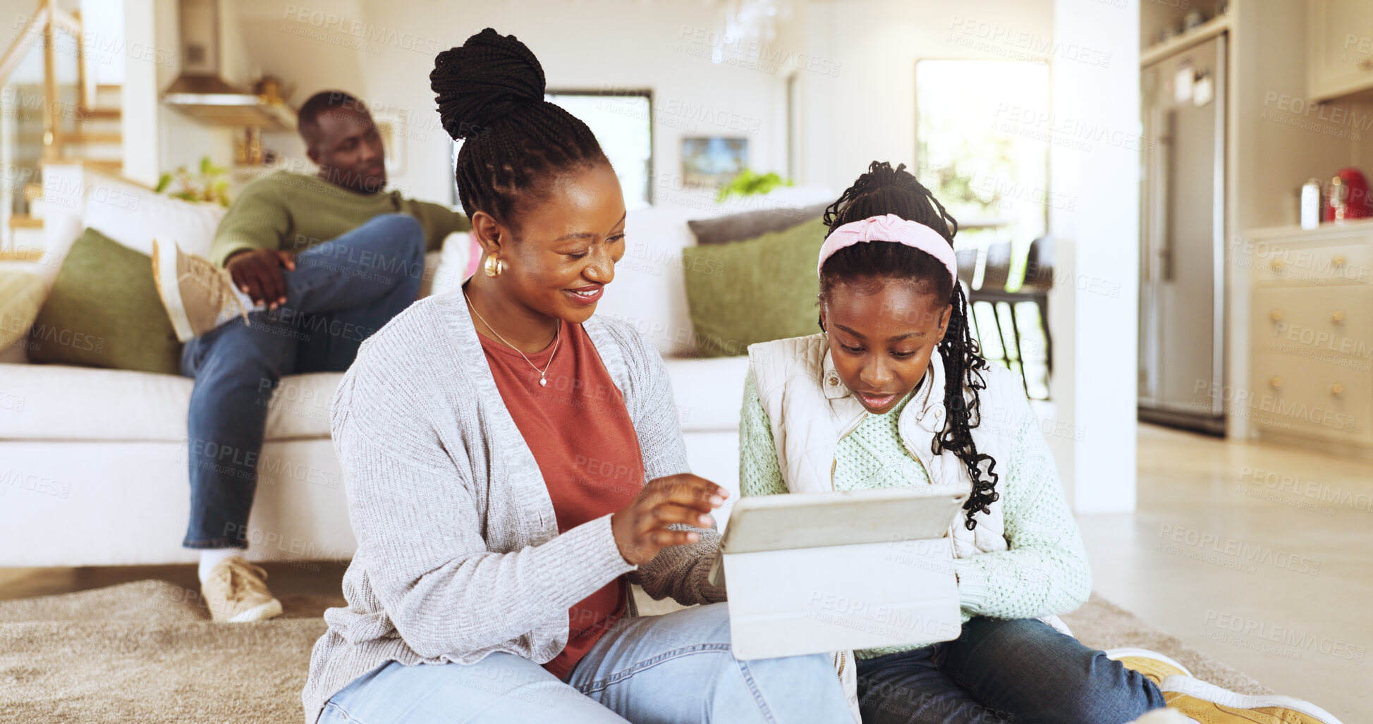 Buy stock photo Online education, mom and child with tablet in house, smile and help with homework on web in lounge. Happy, black woman and elearning with girl for knowledge, growth and development with tech in home