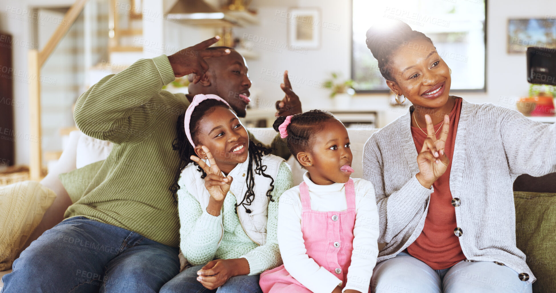 Buy stock photo Peace sign, selfie and African family on sofa in home for social media, online post and memory. Bonding, happy and photo with mom, dad and children with emoji for relationship, connection and love