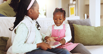 Buy stock photo Children, home and fighting with tablet on couch, online and app disagreement with sister in lounge. Impatient, siblings and black kids with tech for entertainment, conflict or lack of sharing skills