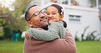 Hug, smile and love with father with daughter outdoor for bonding, support and playful. Care, game and happiness with man and child in backyard of family home for connection, trust and weekend break