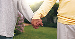 Holding hands, love and couple in backyard for support, security or safety on weekend. Care, comfort and man with woman for connection outdoor in garden with trust in marriage together by home.