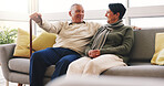 Happy, conversation and senior couple on sofa in home with love, care and marriage together on weekend. Smile, relax and elderly woman with man in living room for relationship, connection or bonding.