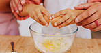 Baking, egg and hands of child with parent in kitchen for learning, help and bonding with dessert. Family, together and person with kid with ingredients, food and bowl for dough, sweet treat or cake
