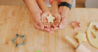 Buy stock photo Baking, star and hands of child with parent in kitchen for learning, help and bonding with dessert. Family, above and person with kid with ingredients, food and shape for dough, cookies and recipe