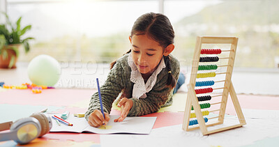 Buy stock photo Child, student and writing with notebook in home for education, studying and maths homework. Girl, kid and sticky notes with stationery for learning, calculation solution and numeracy skills on floor