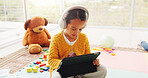 Headphones, tablet and studying with child in home for math assessment, learning or digital lesson. Online course, education app and student project with girl in house for research and growth