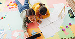 Above, tablet and learning with children in home for math assessment, studying or digital lesson. Online course, education app and student project with kids on floor of house for research and growth