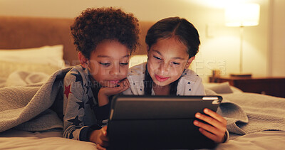 Buy stock photo Tablet, relax and children on bed in home with watching movie, film or series on app on weekend together. Happy, digital technology and kid siblings streaming show or online in bedroom at house.