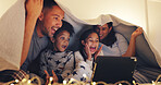 Tablet, scream and family on bed in home with watching horror movie, film or series on app on weekend. Shout, digital technology and parents with kids streaming show online in bedroom with blanket.
