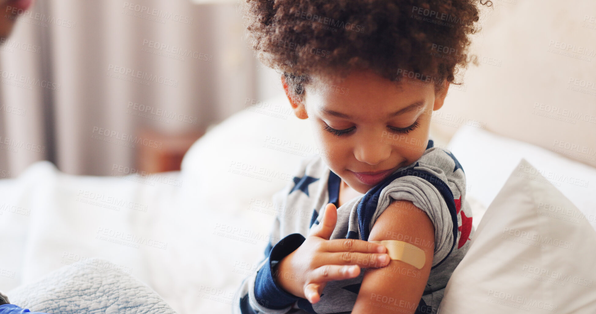 Buy stock photo Healthcare, smile and child with plaster in home, wellness or skin protection after flu vaccination. Happy, boy and recovery from illness on bed, help and infection prevention with bandage in house