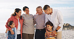 Happy, travel and grandparents with kids at beach for bonding, love and connection on holiday. Family, ocean and children with mom, dad and senior generation for relationship, relax and vacation