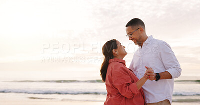 Buy stock photo Happy, beach and couple with dance at sunset for holiday, vacation and affection outdoor on weekend. Love, marriage and man with woman by ocean, sea and nature for bonding, relationship and romance