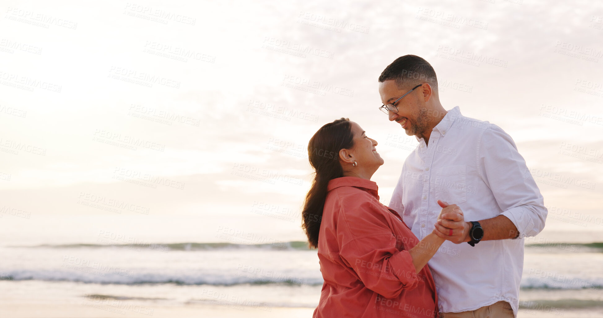 Buy stock photo Happy, beach and couple with dance at sunset for holiday, vacation and affection outdoor on weekend. Love, marriage and man with woman by ocean, sea and nature for bonding, relationship and romance