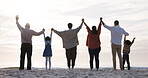Holding hands, back and grandparents with kids at beach for bonding, love and connection on holiday. Family, travel and children with mom, dad and senior generation for relationship, relax and trust