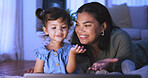 Night, tablet and mom with child in home for internet, online streaming and connection on weekend. Family, happy and mother with girl on digital tech for website, watching videos and bonding together