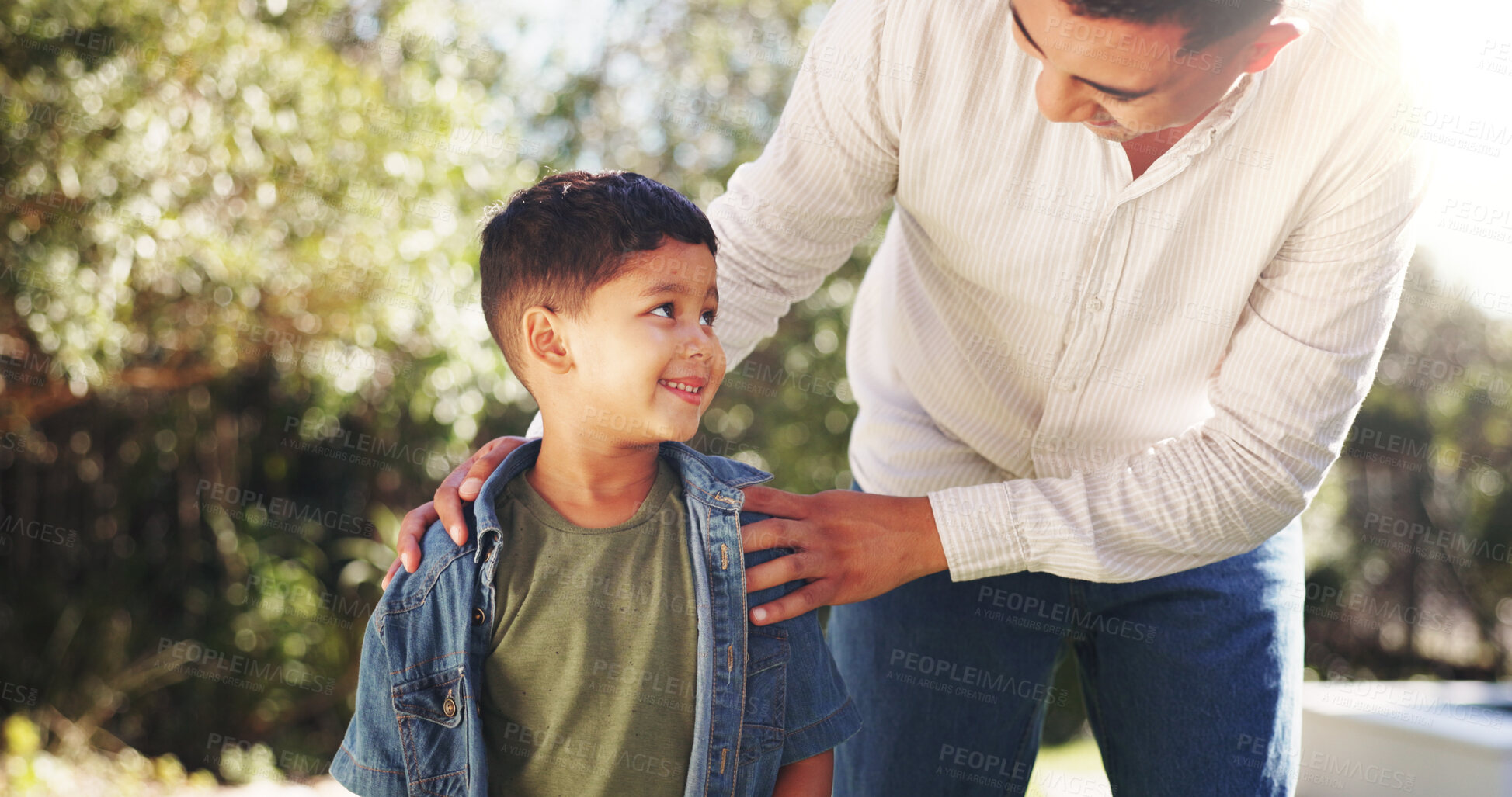 Buy stock photo Happy, dad and bonding with child, backyard and conversation with boy on weekend break and together. Outdoor, man and discussion with son in nature, love and family with smile on holiday at house