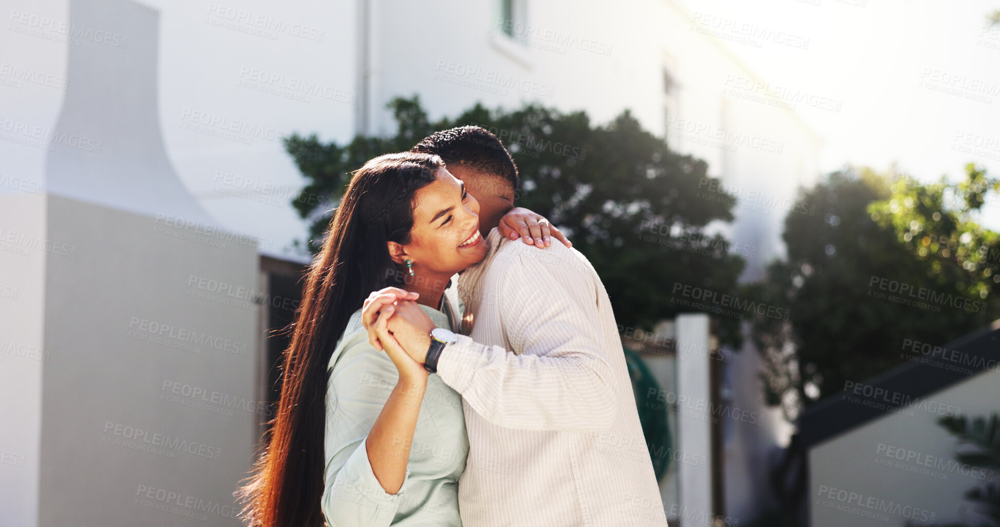 Buy stock photo Outdoor, couple and hug with smile for love, trust and dancing with partner on special day and break. Happy people, affection and celebration for marriage anniversary, home and embrace with rhythm