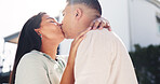 Outdoor, couple and hug at house, kiss and romance with partner on special day and bonding together. People, embrace and celebration for marriage anniversary, home and affection on weekend break