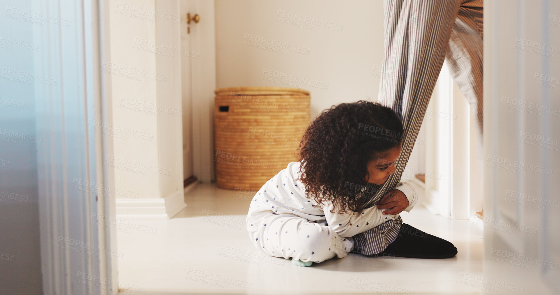 Buy stock photo Leg, parent and attachment with child in family home for emotional security, comfort or struggle. Separation anxiety, attention and walking with girl on floor of apartment for dependence and behavior