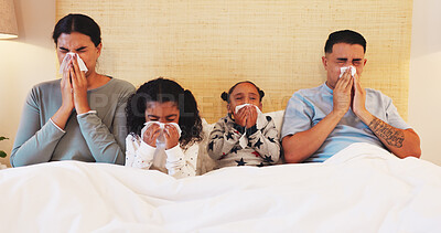 Buy stock photo Blowing nose, sick and tissue with family in bedroom for virus, healthcare crisis and disease. Illness, sneeze and viral outbreak with parents and children in home for cold, germs and influenza 