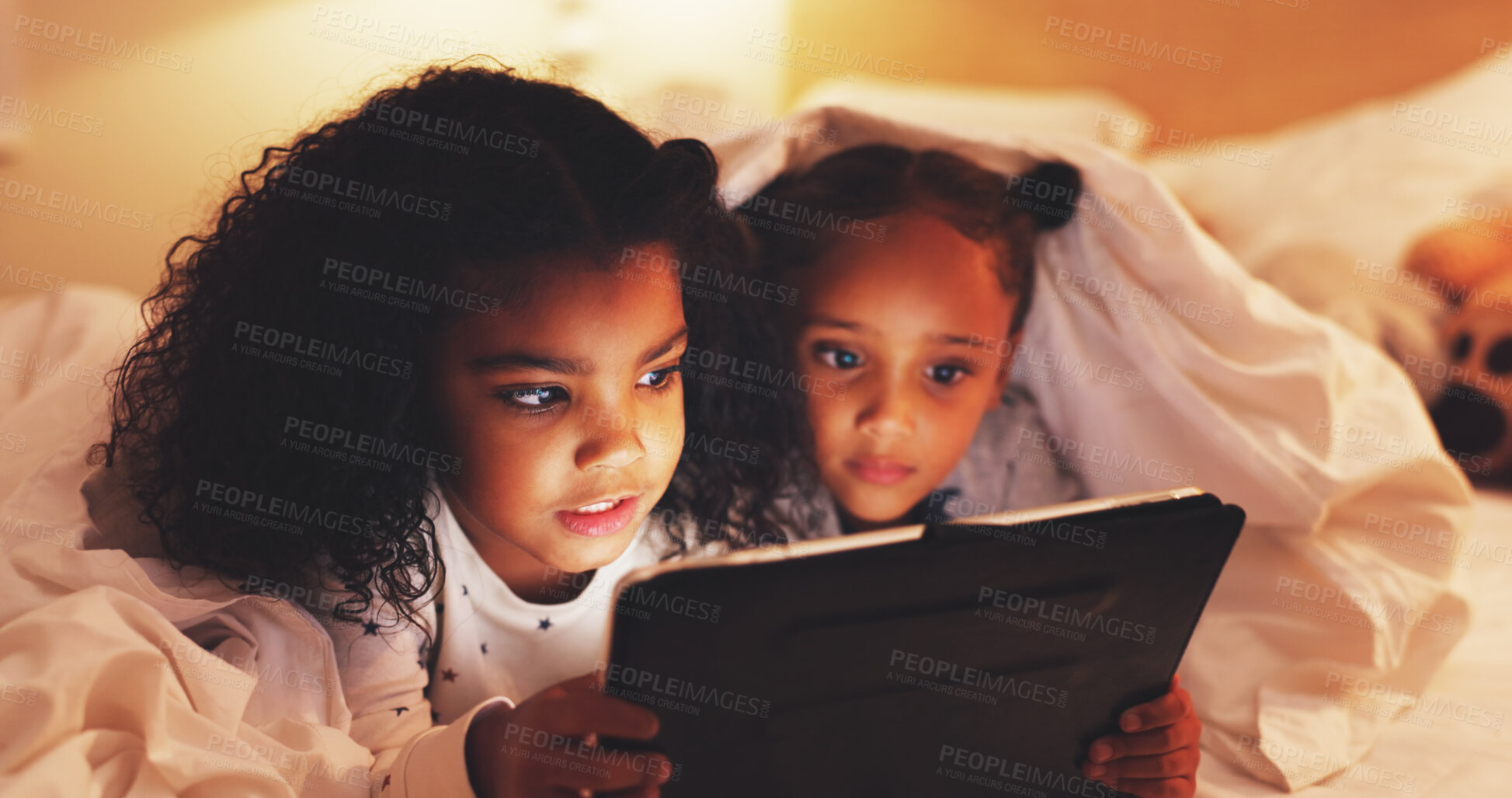 Buy stock photo Search, tablet and watching movie with children in bedroom for streaming service, film and night. Series subscription, late entertainment and weekend break with kids or sisters in bed of family home