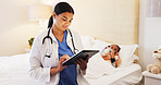 Sick, child and pediatrician with tablet in bedroom, online and reading health records for treatment. Calm, doctor and woman with medical diagnosis on web, home visit and healthcare for girl with flu