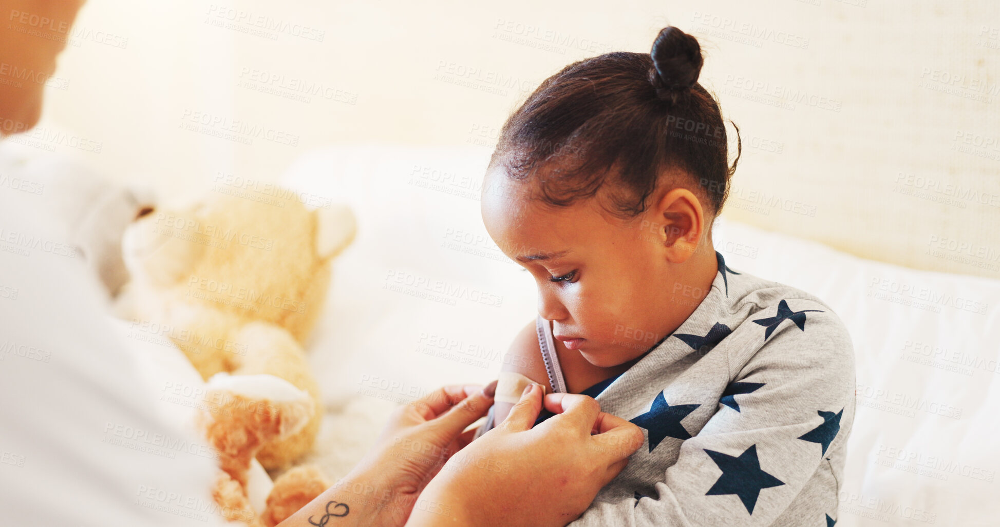 Buy stock photo Plaster, help and mom with child in bedroom of family home for first aid, medical and support. Love, healthcare and accident with kid and parent in bed of apartment for wound care and bandage