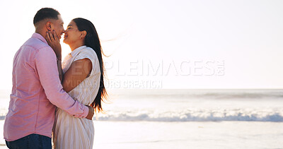 Buy stock photo Hug, nose and touch with couple at beach for connection, romance and anniversary getaway. Marriage commitment, summer vacation and space with man and woman outdoor for support, care and partner