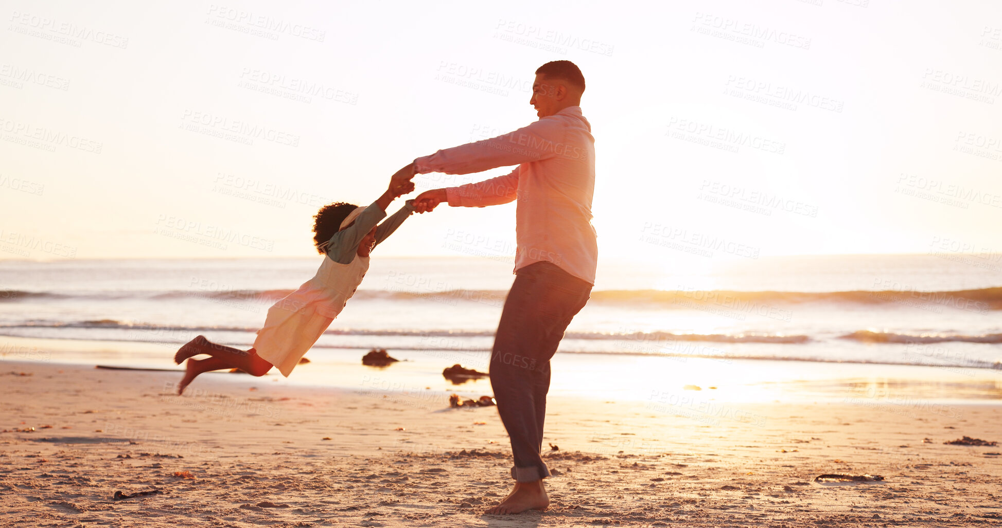 Buy stock photo Spin, sunset and dad with child at beach for playful relationship on holiday, vacation and weekend. Nature, family and father with girl by ocean for playing, laughing and bonding on summer getaway