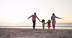 Holding hands, beach and back of parents with kids for family holiday, adventure and weekend. Travel, space and walking by sea with mom, dad and children for bonding, connection and relax on vacation