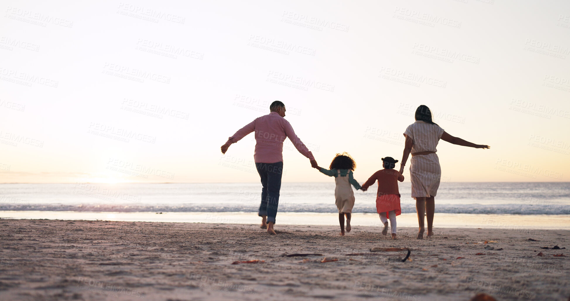 Buy stock photo Holding hands, beach and back of parents with kids for family holiday, adventure and weekend. Travel, space and walking by sea with mom, dad and children for bonding, connection and relax on vacation