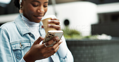 Buy stock photo Coffee, typing and black woman in city with phone for social media, contact and chat in morning. Happy, break and person with drink and cellphone for message, communication and internet in town