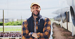 Arms crossed, confidence and farmer with smile for agriculture, sustainability and harvest. Greenhouse, plant and person on farm with agro business for crops, quality control or hydroponics produce