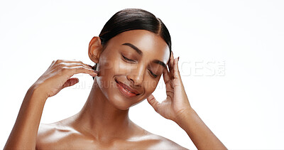 Buy stock photo Confident, woman and smile with skincare in studio for natural beauty, clear skin and shine. Space, female person and eyes closed with cosmetics, facial hydration and healthy glow on white background