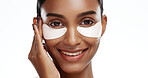 Portrait, woman and eye mask in studio for beauty, skincare benefits and reduction of dark circles. Happy, female person and collagen patch for self care, dermatology and space on white background.