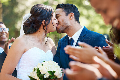 Buy stock photo Smile, couple and kiss at wedding with love, romantic ceremony or commitment celebration. Bokeh, bride and groom with affection, guest cheering and emotional connection for special occasion in nature