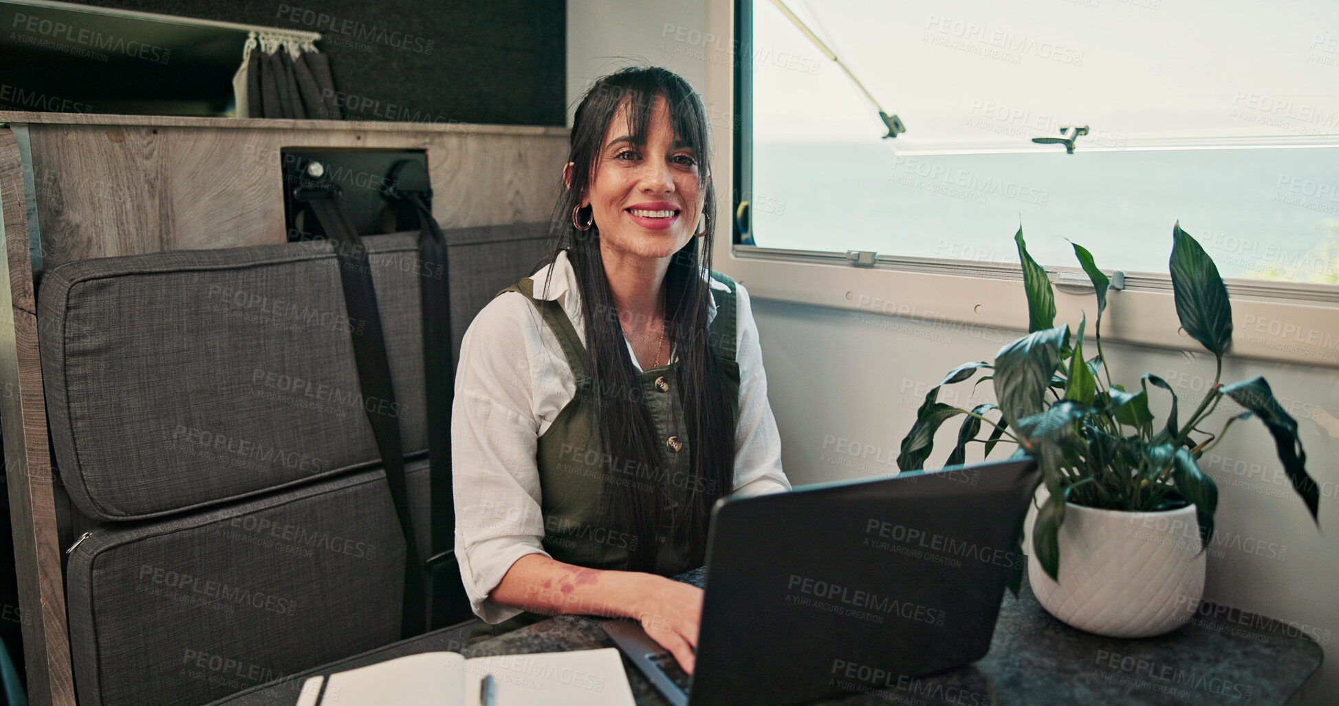 Buy stock photo Laptop, caravan and portrait of woman with research for remote work with creative project on trip. Computer, travel and magazine editor with freelance article for publishing in vehicle for holiday.