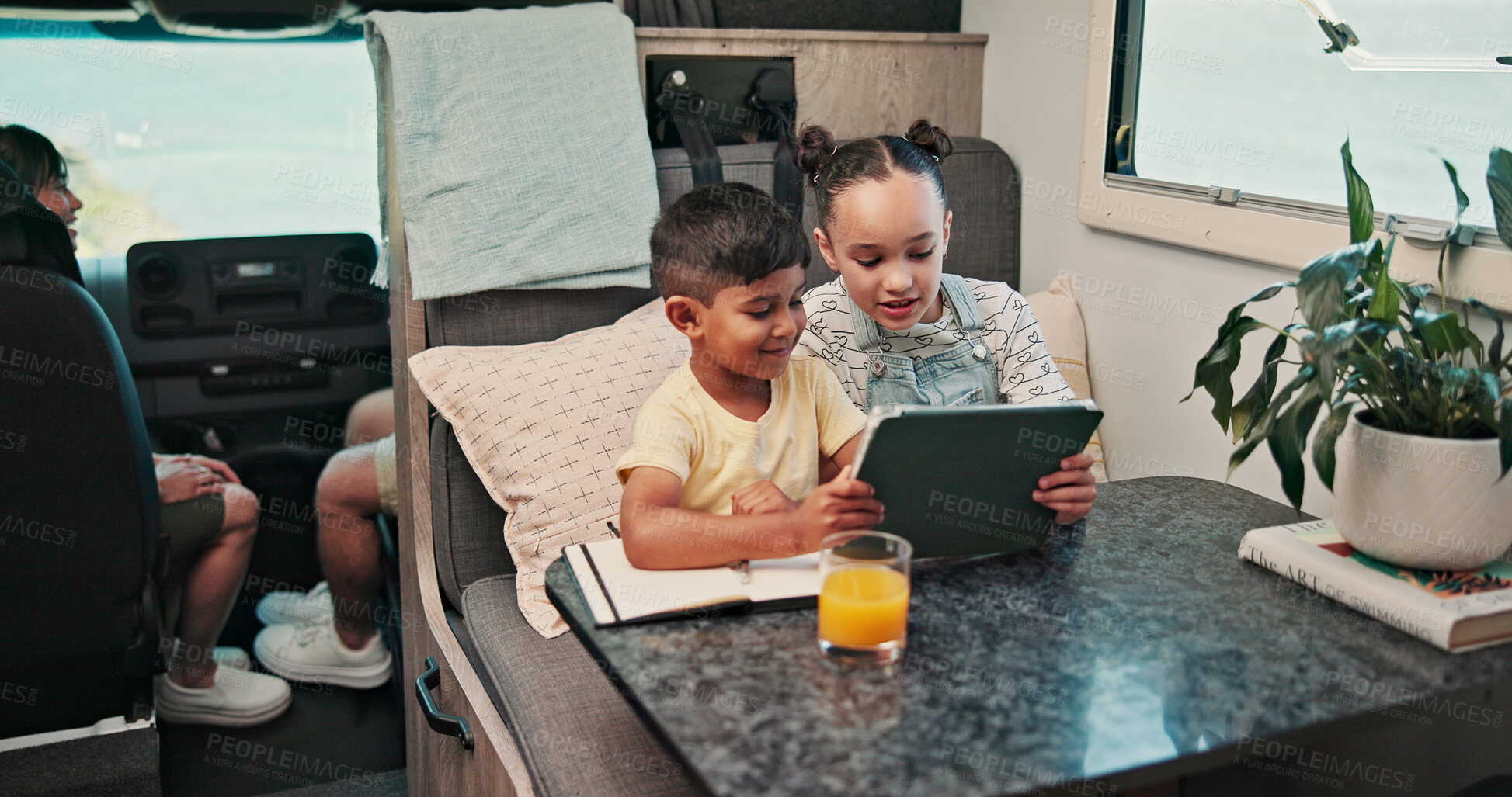 Buy stock photo Happy, tablet and children in camper van for online videos, movies and entertainment on road trip. Family, siblings and kids on digital tech for internet, bonding and relax on vacation in mobile home