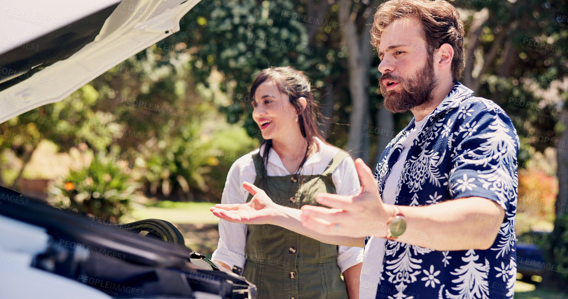 Buy stock photo Frustrated, check and couple with car breakdown in nature, travel crisis and conflict for engine problem. Angry, stress or people with blame for road trip failure, outdoor or towing service dispute