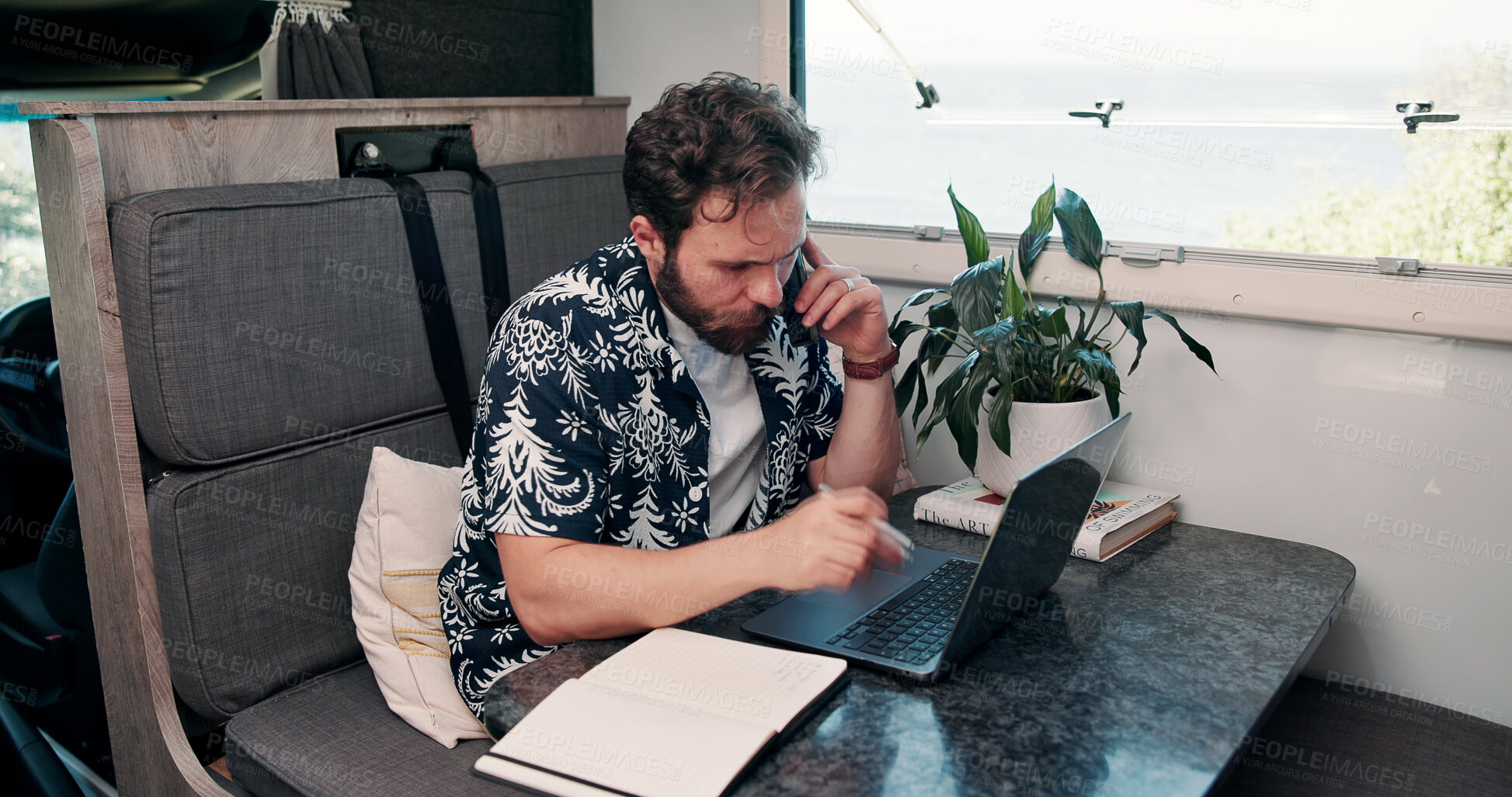 Buy stock photo Remote work, phone call and man on laptop in camper van for tourist guide, copywriting and notes. Freelancer, vehicle and person on computer for submission, travel blog or talking for nomad living
