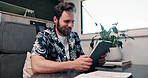 Tablet, caravan and businessman with research for remote work with creative project on weekend trip. Technology, travel and male magazine editor with freelance article for publishing in vehicle.