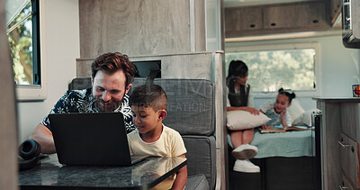 Buy stock photo Happy, dad and child on laptop in camper van for nomad living, travel and bonding in mobile home. Family, vehicle and father with boy on computer for online videos, movies and relax on vacation