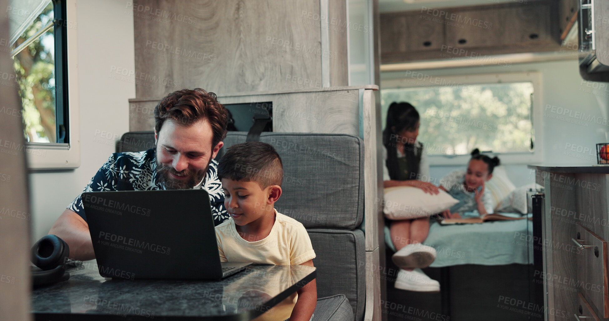 Buy stock photo Happy, dad and child on laptop in camper van for nomad living, travel and bonding in mobile home. Family, vehicle and father with boy on computer for online videos, movies and relax on vacation