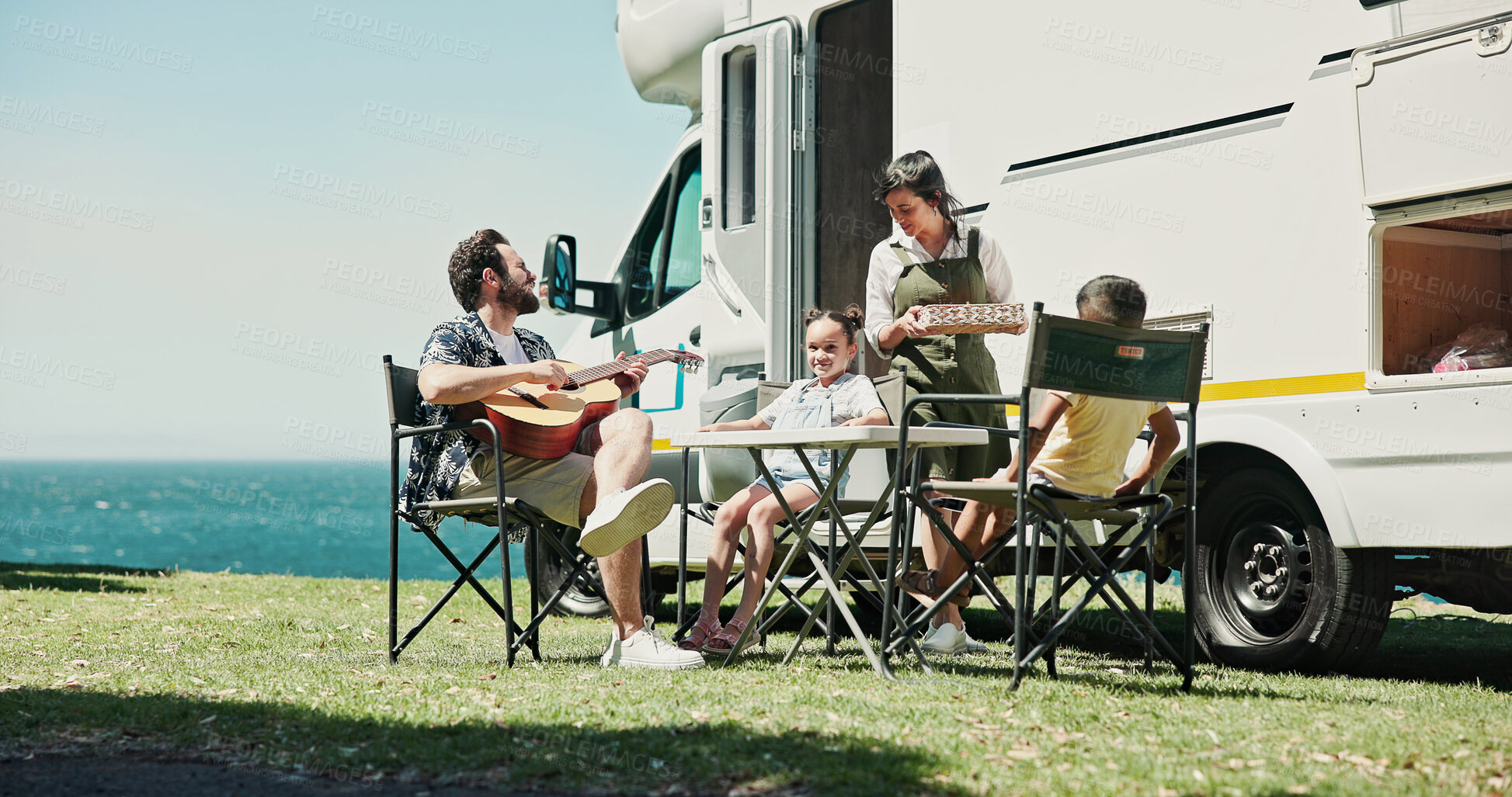 Buy stock photo Happy, guitar and parents with kids by camper van for nomad living, travel and adventure together. Music, outdoor and family with children by vehicle for holiday, journey or road trip in mobile home 
